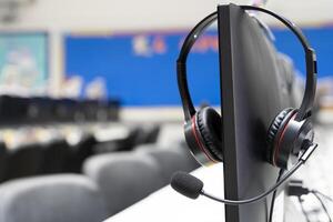 Headset is a symbol of communication and collaboration. It allows the agent to connect with the customer and provide them with the help they need. photo