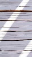 white wood with diagonal shadows photo