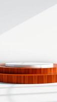 white circular platform on a wooden base against a white wall with sunlight reflection photo