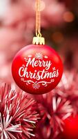 red christmas ornament with a festive message photo