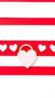 pink heart on a striped background photo