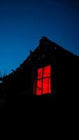 glowing window a weathered structure photo