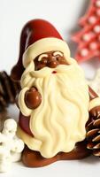white chocolate figure a festive character stands with chocolate decorations photo