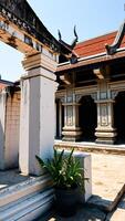 white building with intricate details sunlight photo
