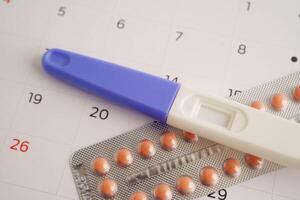 Pregnancy test for female of ovulation day, fetus, maternity, childbirth, birth control. photo