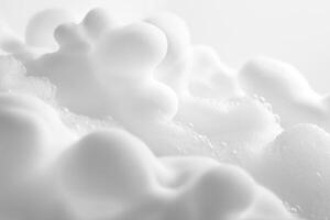 Minimalistic close up of white foam bubbles photo