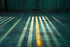 The shadow of a street light casting a linear texture on the ground photo