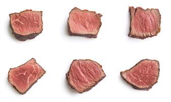A close up of six different cuts of meat, all of which are red photo