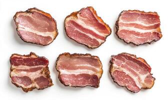 A close up of six slices of bacon, each with a different amount of fat photo