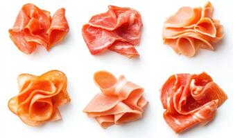 A close up of six different types of meat, including ham, salami, and prosciutto photo