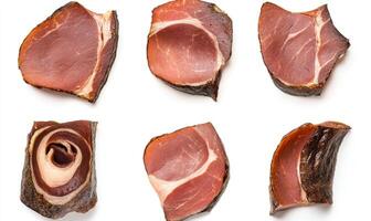 A close up of different cuts of meat, including bacon, ham, and sausage photo