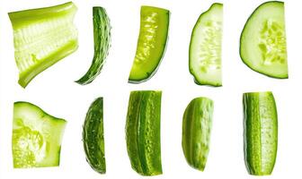 A series of cucumber slices, each with a different shape and size photo