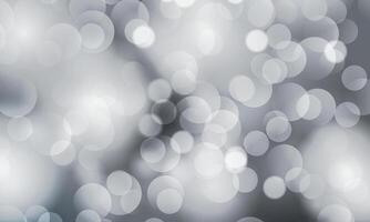 Bokeh shiny blurred lights on gray background. abstract circles. vector