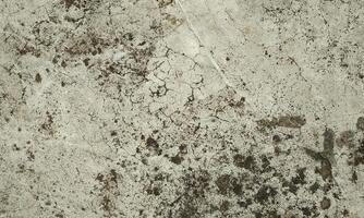 Peeling Grunge Wall Texture.Patched and Deteriorating Wall.Rusty and Dilapidated Wall Surface.Chipped and Peeling Plaster Texture.Cracked and Textured Cement Wall.Rough and Flaking Mortar Texture. photo