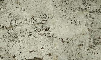 Peeling Grunge Wall Texture.Patched and Deteriorating Wall.Rusty and Dilapidated Wall Surface.Chipped and Peeling Plaster Texture.Cracked and Textured Cement Wall.Rough and Flaking Mortar Texture. photo