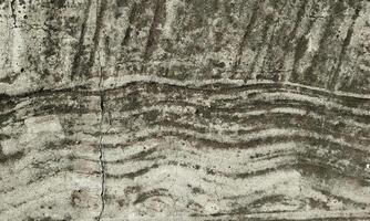 Peeling Grunge Wall Texture.Patched and Deteriorating Wall.Rusty and Dilapidated Wall Surface.Chipped and Peeling Plaster Texture.Cracked and Textured Cement Wall.Rough and Flaking Mortar Texture. photo