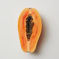 a cut open papaya on a white background photo