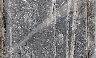 Peeling Grunge Wall Texture.Patched and Deteriorating Wall.Rusty and Dilapidated Wall Surface.Chipped and Peeling Plaster Texture.Cracked and Textured Cement Wall.Rough and Flaking Mortar Texture. photo