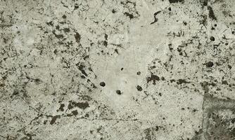 Peeling Grunge Wall Texture.Patched and Deteriorating Wall.Rusty and Dilapidated Wall Surface.Chipped and Peeling Plaster Texture.Cracked and Textured Cement Wall.Rough and Flaking Mortar Texture. photo
