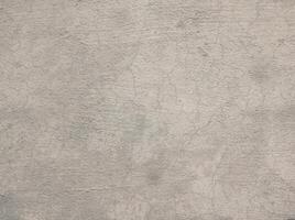 Peeling Grunge Wall Texture.Patched and Deteriorating Wall.Rusty and Dilapidated Wall Surface.Chipped and Peeling Plaster Texture.Cracked and Textured Cement Wall.Rough and Flaking Mortar Texture. photo