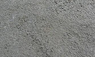 Peeling Grunge Wall Texture.Patched and Deteriorating Wall.Rusty and Dilapidated Wall Surface.Chipped and Peeling Plaster Texture.Cracked and Textured Cement Wall.Rough and Flaking Mortar Texture. photo