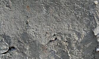 Floor concrete texture and abstract background.cracked concrete vintage wall background old wall.Grunge background or texture with scratches and cracks.Aged cement background for texture backdrop photo