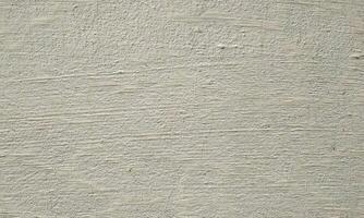 Peeling Grunge Wall Texture.Patched and Deteriorating Wall.Rusty and Dilapidated Wall Surface.Chipped and Peeling Plaster Texture.Cracked and Textured Cement Wall.Rough and Flaking Mortar Texture. photo