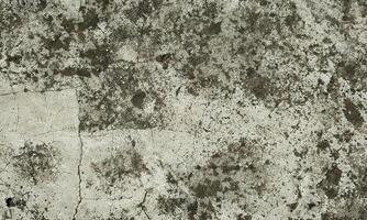 Peeling Grunge Wall Texture.Patched and Deteriorating Wall.Rusty and Dilapidated Wall Surface.Chipped and Peeling Plaster Texture.Cracked and Textured Cement Wall.Rough and Flaking Mortar Texture. photo