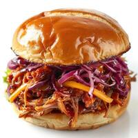 a pulled pork sandwich with coleslaw and carrots photo