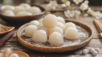 A plate full of delectable and artfully crafted Asian buns, possibly bite-sized, photo