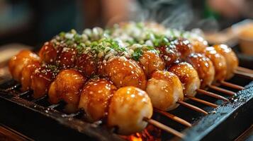 Grilled skewers of meat coated in a savory glaze, photo