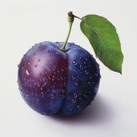 A close-up photo of a purple fruit with drops of water on it.