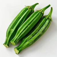 A bunch of fresh green beans laying next to each other. photo