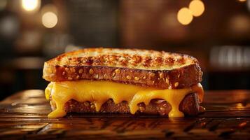 A tasty golden toasted grilled cheese sandwich with melted cheese oozing out of it, photo