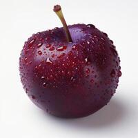 Red and shiny fresh apple covered in dew drops. photo
