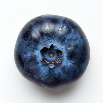 A single blueberry in focus with a textured surface, showing the natural color and patterns. photo