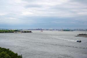 View from the Brooklyn Bridge towards the Statue of Liberty photo