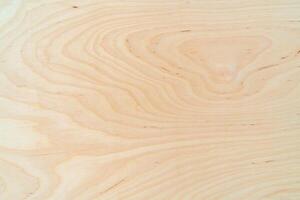 Light plywood texture. Patterned wooden background. Wood product. photo