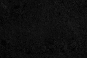 Black abstract background. Dark texture of rough surface. photo