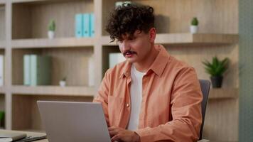 Business worker male businessman Caucasian guy man office employee designer architect manager smiling working complete tasks online studying laptop browsing internet computer programming in office video