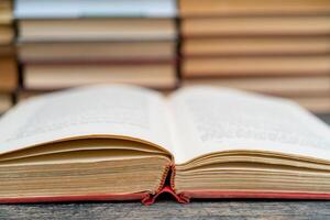 Old book in the red obnozhka. Symbol of knowledge and learning. photo