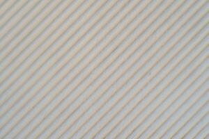 Diagonal White plastered old wall. Abstract construction background. photo