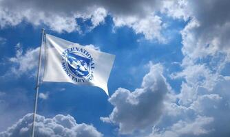 imf international monetary fund gross domestic product stock market exchange blue sky cloudy background copy space flag banking financial economy debt investment currency crisis inflation trader loan photo