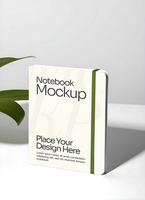 Notebook Mockup with simple leaf background psd