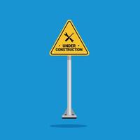 under construction in a building, a wrench and a screwdriver crossed on a yellow triangle sign. Suitable for posters and web icons vector
