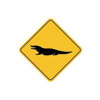 road sign icon, crocodile crossing on yellow rhombus. board.suitable for poster use and web icon vector
