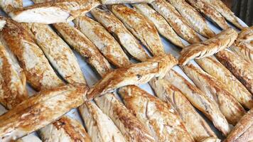 A visually appealing and delicious grilled fish is attractively displayed for sale video