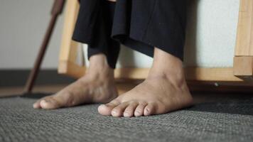 Experience a Calm and Reflective Foot Perspective in a Cozy and Inviting Room Space video