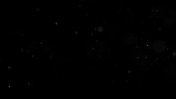 Real dust particles flying in the air. Background of dust particles and beautiful bokeh. Slow macro photography. video
