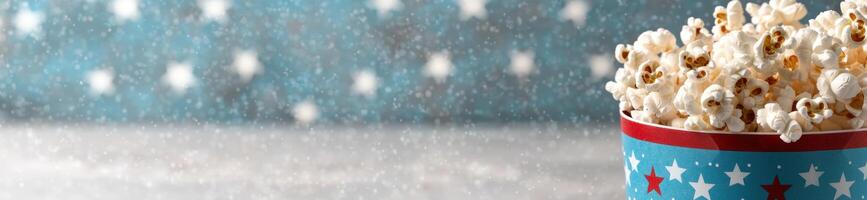 popcorn in a festive bucket with snowy background photo
